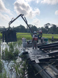 6.3 FARMA log crane on barge at Zulu Marine Services.