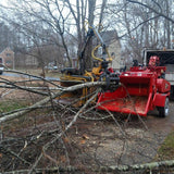 FARMA 3.8D crane installed on Bandit chipper with Morbark